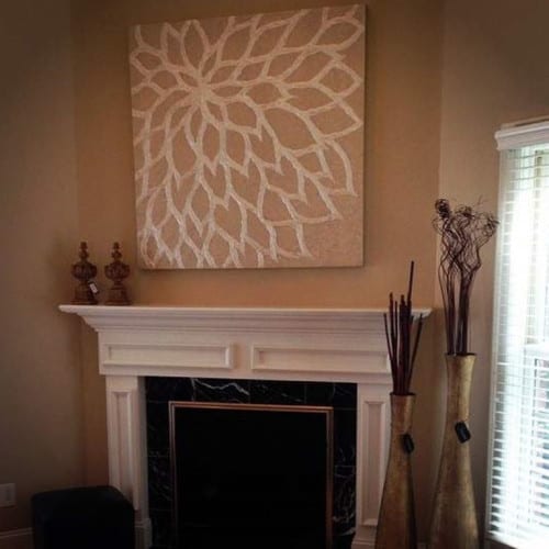 this mantel space has a large rough opening for a flat-screen TV. To cover the hole, we put in place a beautiful canvas