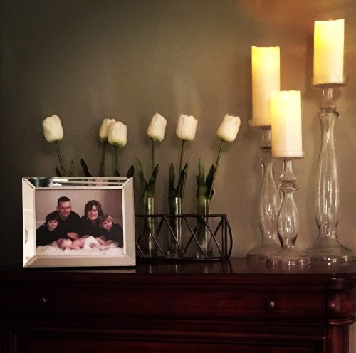 don't forget to incorporate candlelight and flowers to add a touch of softness and warmth