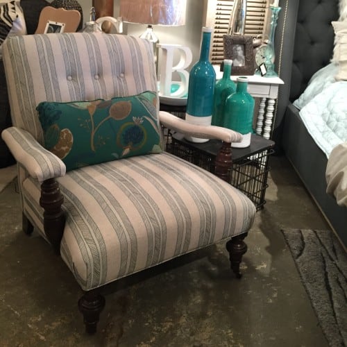 Logan #8 has a neutral background with a pop of color in its turquoise stitching and an accent kidney pillow fabric that adds a touch of fun and glam
