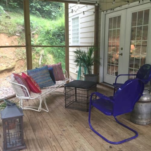 Be a little more creative with pops of color in fun rooms like this sun porch. IT makes it feel fun and inviting and like it's just begging for that potential buyer to host a great house warming party!
