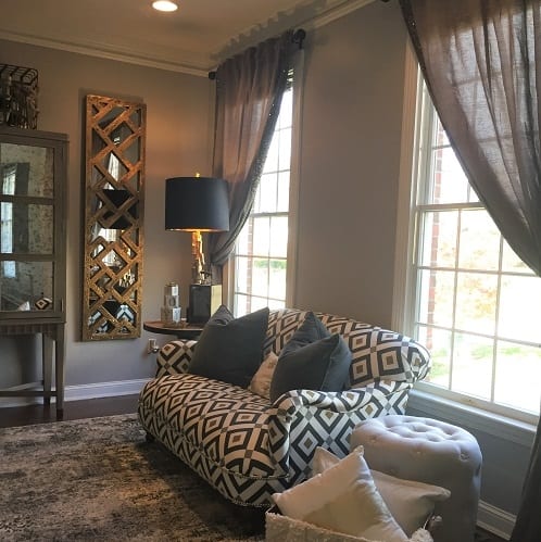 A warm and inviting color palette mixed with contemporary patterns and materials sets the new tone for the Layne's home